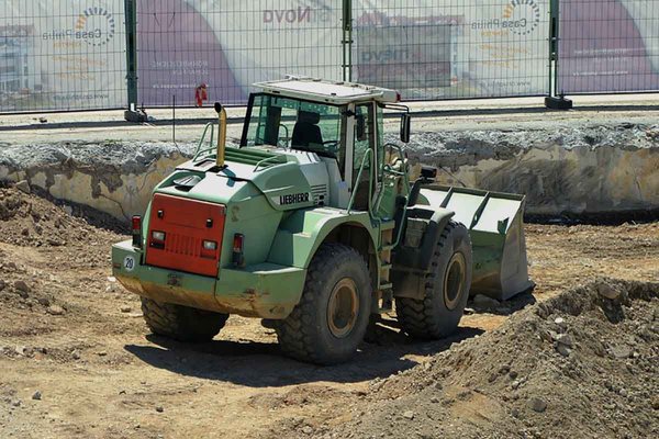 Conducteur de pelle hydraulique-chargeuse pelleteuse